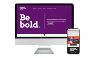 A desktop monitor and a smartphone display a marketing agency’s bold, purple-themed website. The screen reads “Be bold. Turning marketing into success.” with navigation links and the agency’s logo visible.